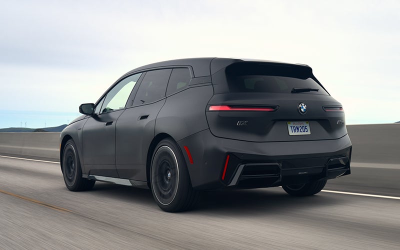 The BMW iX M70 driving rear shot. | Taylor BMW in Evans GA